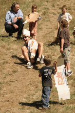 the Pope goes for a slide down the hill